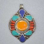 Hand Carved Metal Pendents